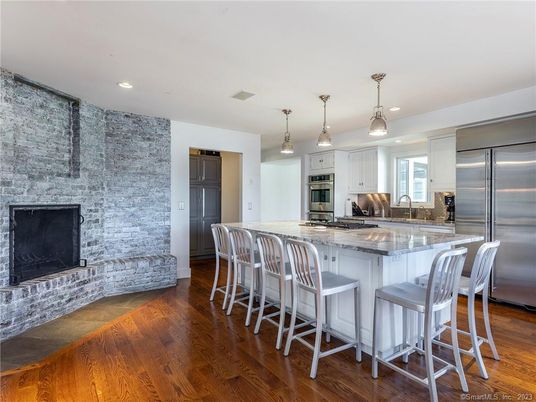 Interior, Kitchen, Pendant Lights, Recessed Lighting, Stainless Steel Appliances, Stone Walls, Wood Texture Flooring