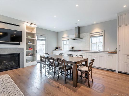Dining room, Fireplace, Interior, Kitchen, Recessed Lighting, Wood Texture Flooring