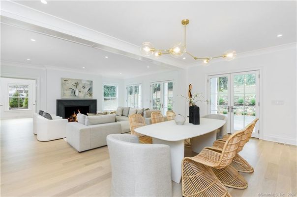 Dining room, Fireplace, Interior, Living room, Pendant Lights, Recessed Lighting, Wood Texture Flooring