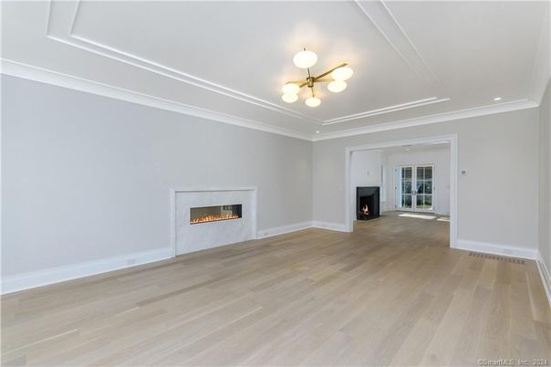 Empty room, Fireplace, Interior, Recessed Lighting, Wood Texture Flooring