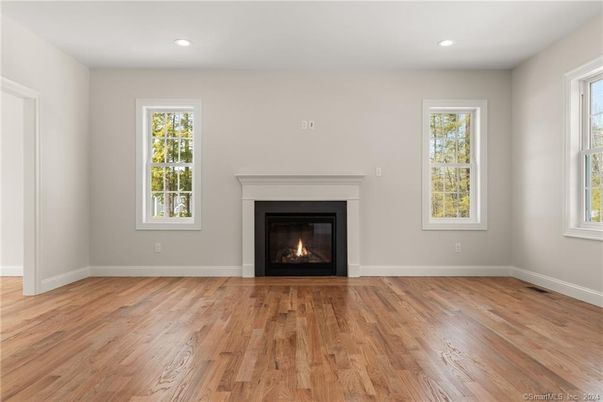 Empty room, Fireplace, Interior, Recessed Lighting, Wood Texture Flooring