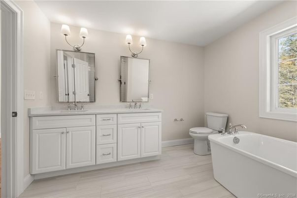 Bathroom, Dual Sink Vanities, Free Standing Baths, Interior, Wood Texture Flooring