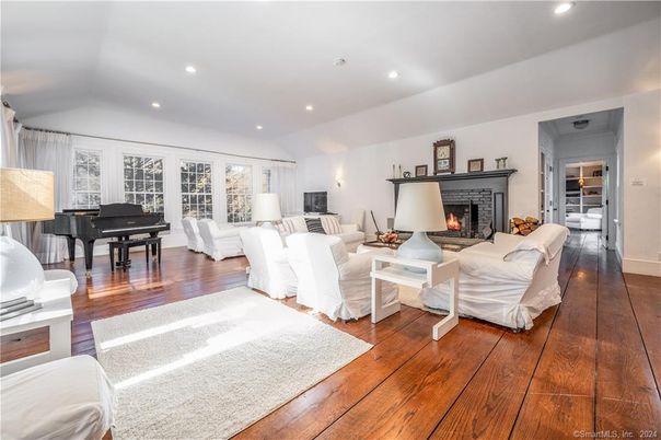 Fireplace, Interior, Living room, Piano, Recessed Lighting, Wood Texture Flooring