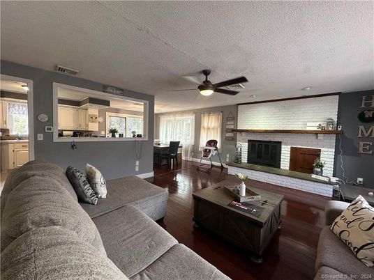 Dining room, Fireplace, Interior, Living room, Stone Walls, Wood Texture Flooring