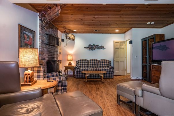 Fireplace, Interior, Living room, Recessed Lighting, Stone Walls, Wooden Ceilings, Wood Texture Flooring