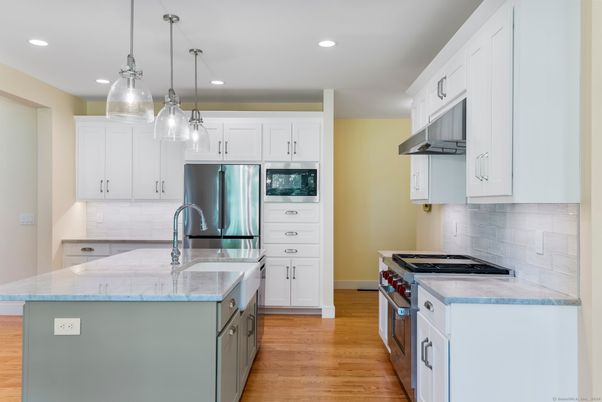 Interior, Kitchen, Pendant Lights, Recessed Lighting, Stainless Steel Appliances, Wood Texture Flooring