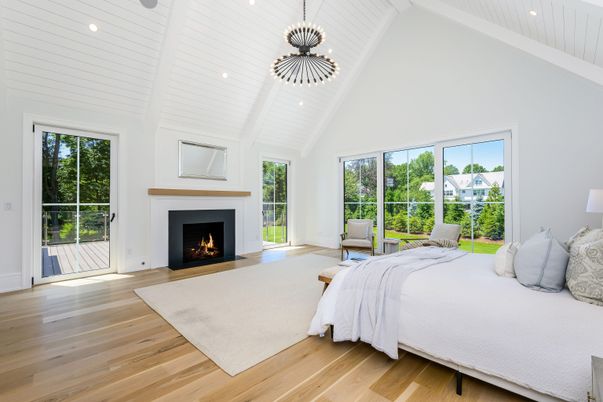 Bedroom, Fireplace, Interior, Pendant Lights, Recessed Lighting, Wood Texture Flooring