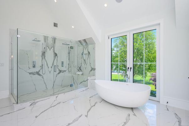 Bathroom, Free Standing Baths, Glass Shower, Interior, Marble, Marble Walls, Recessed Lighting