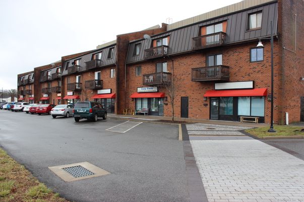 Exterior, Facade, Brick Facade, Condo Building