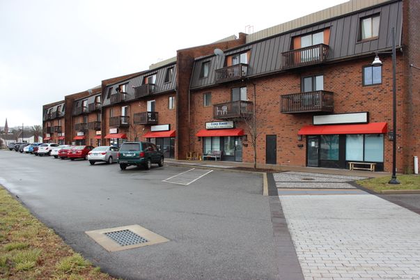Exterior, Facade, Brick Facade, Condo Building