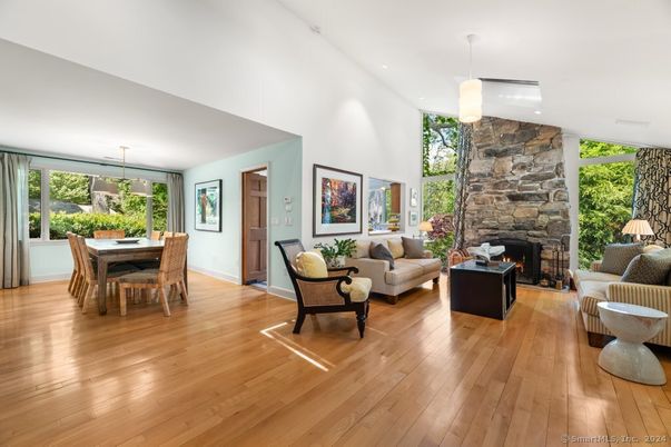 Dining room, Fireplace, Interior, Living room, Pendant Lights, Stone Walls, Wood Texture Flooring