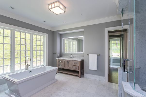Bathroom, Dual Sink Vanities, Free Standing Baths, Glass Shower, Interior, Marble, Marble Walls, Recessed Lighting