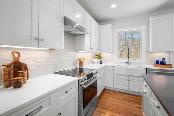 Interior, Kitchen, Recessed Lighting, Stainless Steel Appliances, Wood Texture Flooring