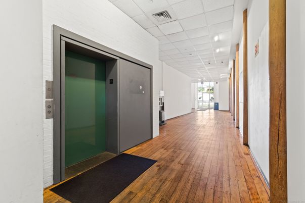Elevator, Interior, Recessed Lighting, Wood Texture Flooring