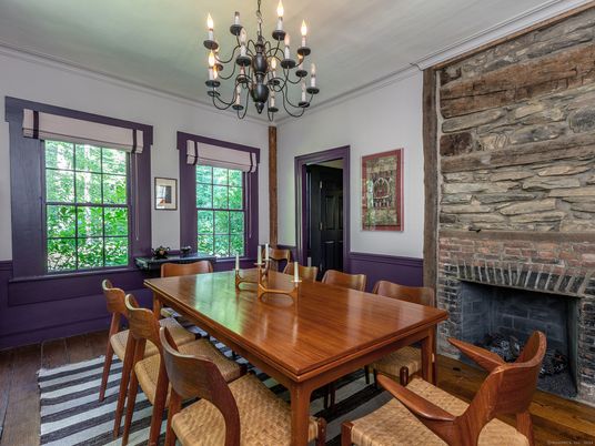 Chandelier, Dining room, Fireplace, Interior, Stone Walls, Wood Texture Flooring