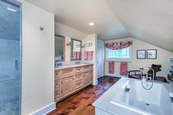 Bathroom, Dual Sink Vanities, Interior, Recessed Lighting, Wood Texture Flooring