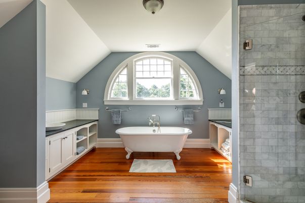 Bathroom, Dual Sink Vanities, Free Standing Baths, Glass Shower, Interior, Marble Walls, Wood Texture Flooring