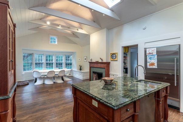 Dining room, Fireplace, Interior, Kitchen, Stainless Steel Appliances, Wood Texture Flooring