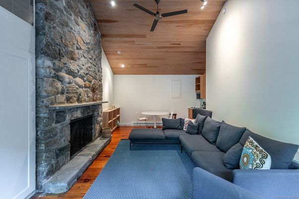 Fireplace, Interior, Living room, Recessed Lighting, Stone Walls, Wooden Ceilings, Wood Texture Flooring