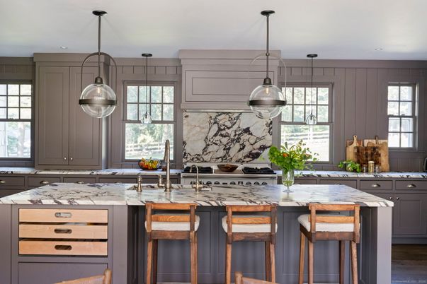 Interior, Kitchen, Marble Walls, Pendant Lights, Recessed Lighting, Stainless Steel Appliances, Wood Texture Flooring