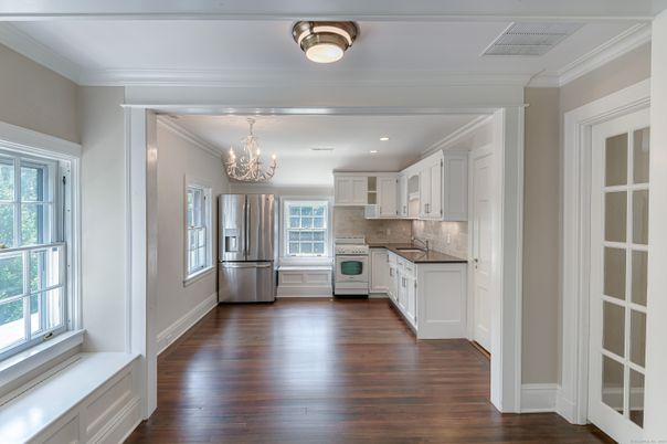 Chandelier, Interior, Kitchen, Recessed Lighting, Stainless Steel Appliances, Wood Texture Flooring