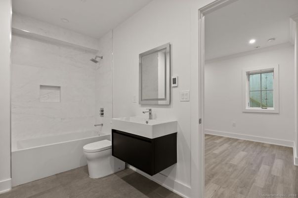 Bathroom, Interior, Marble Walls, Recessed Lighting, Wood Texture Flooring