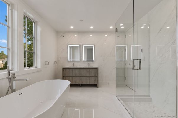 Bathroom, Dual Sink Vanities, Free Standing Baths, Glass Shower, Interior, Marble, Marble Walls, Recessed Lighting