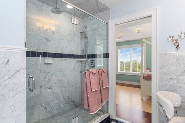 Bathroom, Glass Shower, Interior, Marble Walls, Recessed Lighting, Wood Texture Flooring