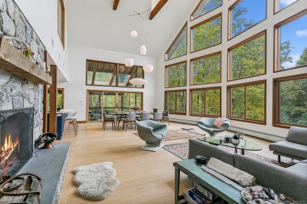 Dining room, Fireplace, Interior, Living room, Pendant Lights, Stone Walls, Wood Texture Flooring