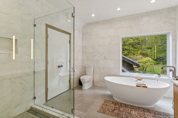 Bathroom, Free Standing Baths, Glass Shower, Interior, Marble Walls, Recessed Lighting