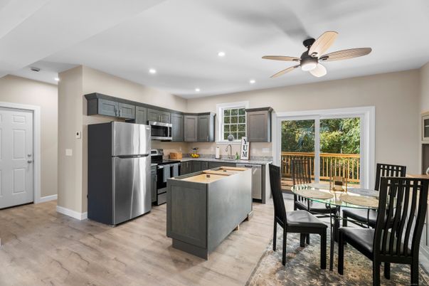 Dining room, Interior, Kitchen, Recessed Lighting, Stainless Steel Appliances, Wood Texture Flooring