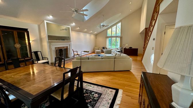 Dining room, Fireplace, Interior, Living room, Recessed Lighting, Wood Texture Flooring