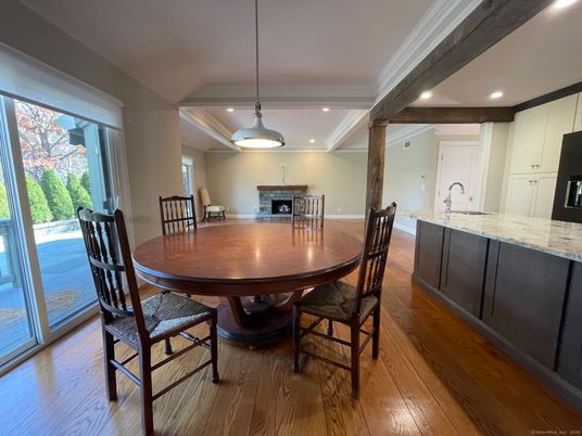 Dining room, Fireplace, Interior, Pendant Lights, Recessed Lighting, Wood Texture Flooring