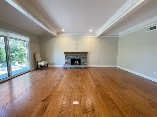 Empty room, Fireplace, Interior, Recessed Lighting, Wood Texture Flooring