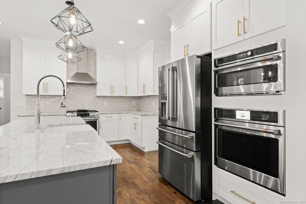 Interior, Kitchen, Pendant Lights, Recessed Lighting, Stainless Steel Appliances, Wood Texture Flooring