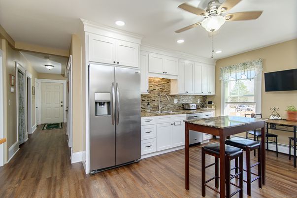 Dining room, Interior, Kitchen, Recessed Lighting, Stainless Steel Appliances, Wood Texture Flooring