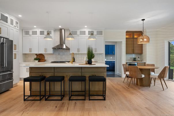 Dining room, Interior, Kitchen, Pendant Lights, Recessed Lighting, Stainless Steel Appliances, Wood Texture Flooring