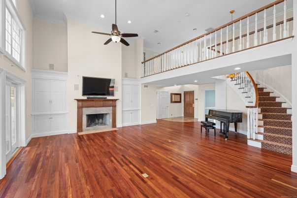Fireplace, Interior, Piano, Recessed Lighting, Wood Texture Flooring