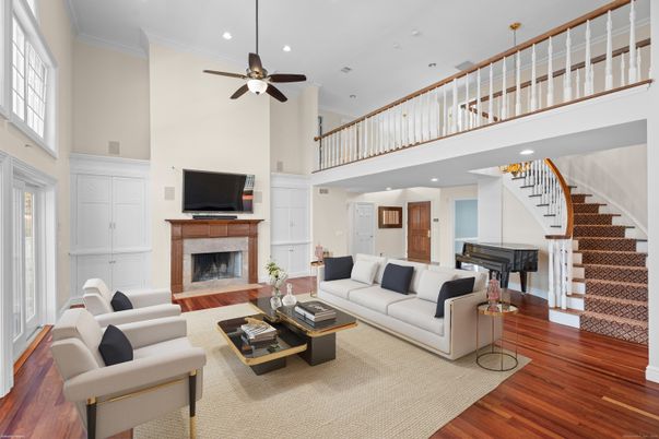 Fireplace, Interior, Living room, Piano, Recessed Lighting, Wood Texture Flooring