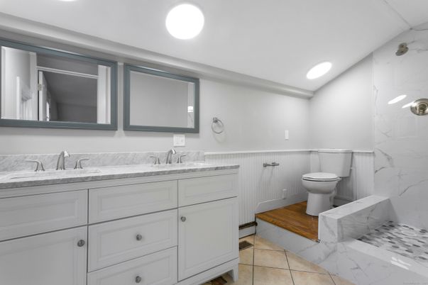 Bathroom, Dual Sink Vanities, Interior, Marble, Marble Walls, Recessed Lighting