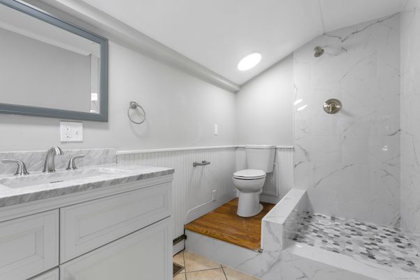 Bathroom, Interior, Marble, Marble Walls, Recessed Lighting, Wood Texture Flooring