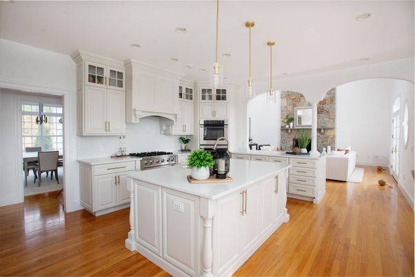 Dining room, Interior, Kitchen, Pendant Lights, Recessed Lighting, Stainless Steel Appliances, Wood Texture Flooring