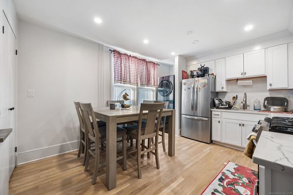 Dining room, Interior, Kitchen, Recessed Lighting, Stainless Steel Appliances, Wood Texture Flooring