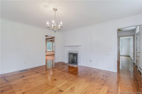 Chandelier, Empty room, Fireplace, Interior, Wood Texture Flooring