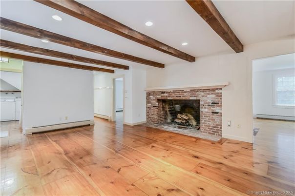 Empty room, Fireplace, Interior, Recessed Lighting, Wooden Beams, Wood Texture Flooring