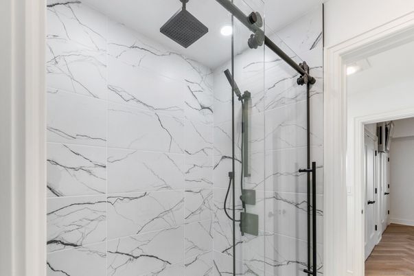 Bathroom, Glass Shower, Interior, Marble Walls, Wood Texture Flooring