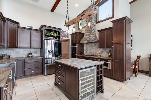 Interior, Kitchen, Pendant Lights, Recessed Lighting, Stainless Steel Appliances, Stone Walls, Wooden Beams