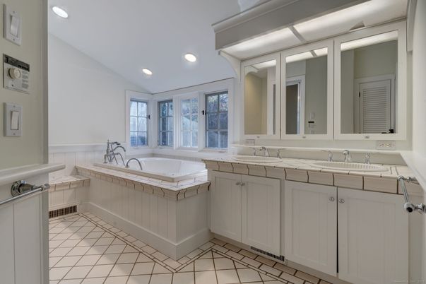 Bathroom, Dual Sink Vanities, Interior, Recessed Lighting, Tile Countertops