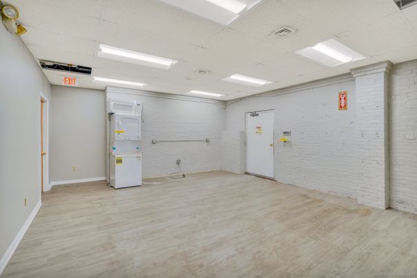 Empty room, Interior, Recessed Lighting, Stone Walls, Wood Texture Flooring