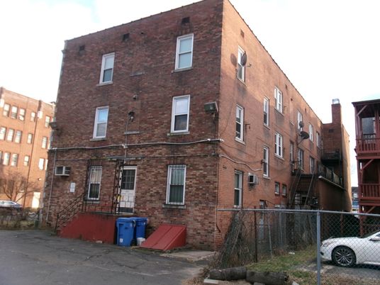 Exterior, Facade, Brick Facade, Condo Building